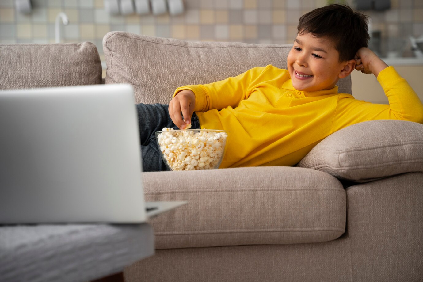 little-boy-watching-films-laptop_23-2150358723
